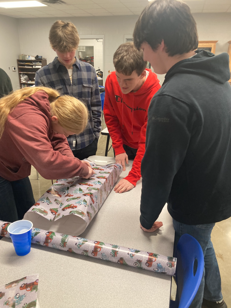 FFA students wrap gifts